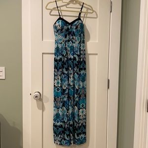 Teal and blue paisley patterned jumpsuit with spaghetti straps.